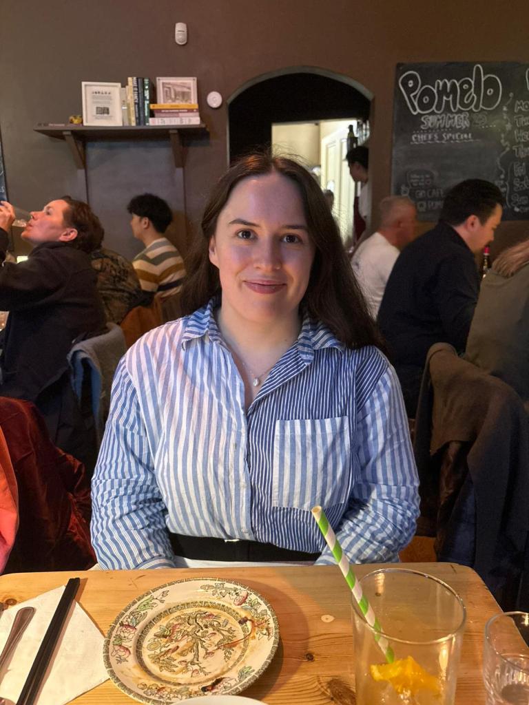 I smile at the dinner table