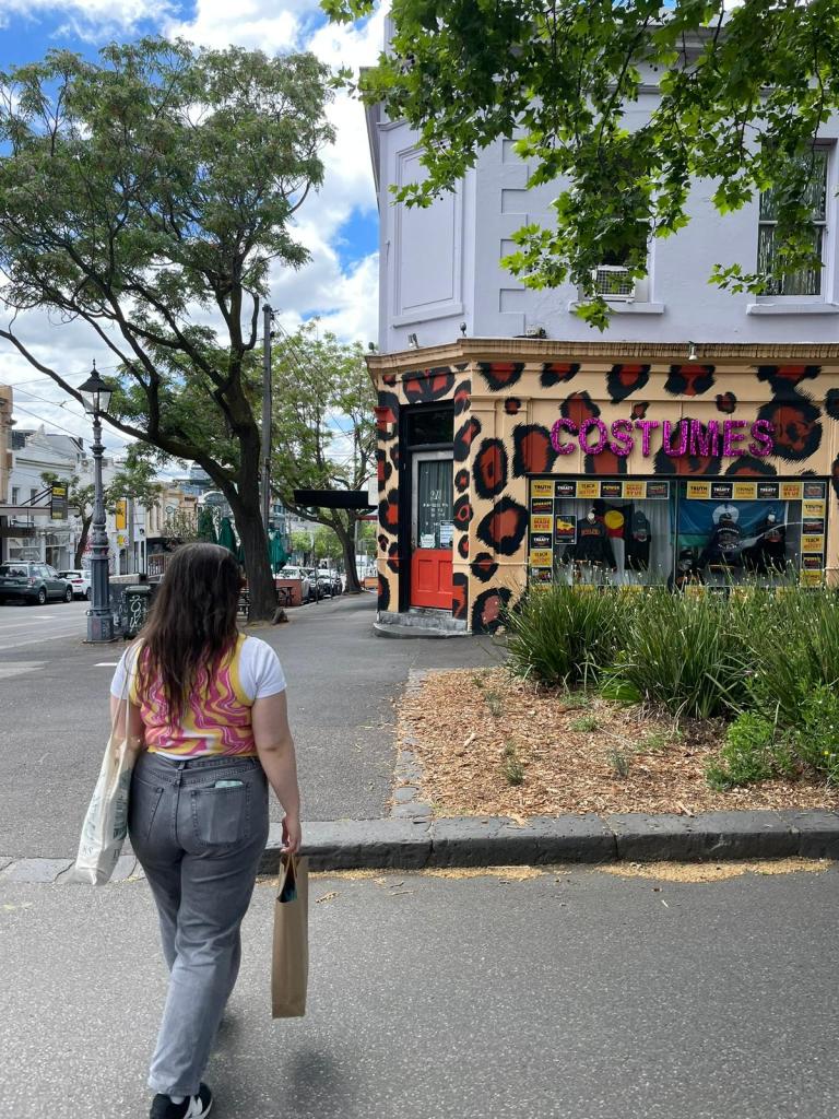 I wander around colourful shops