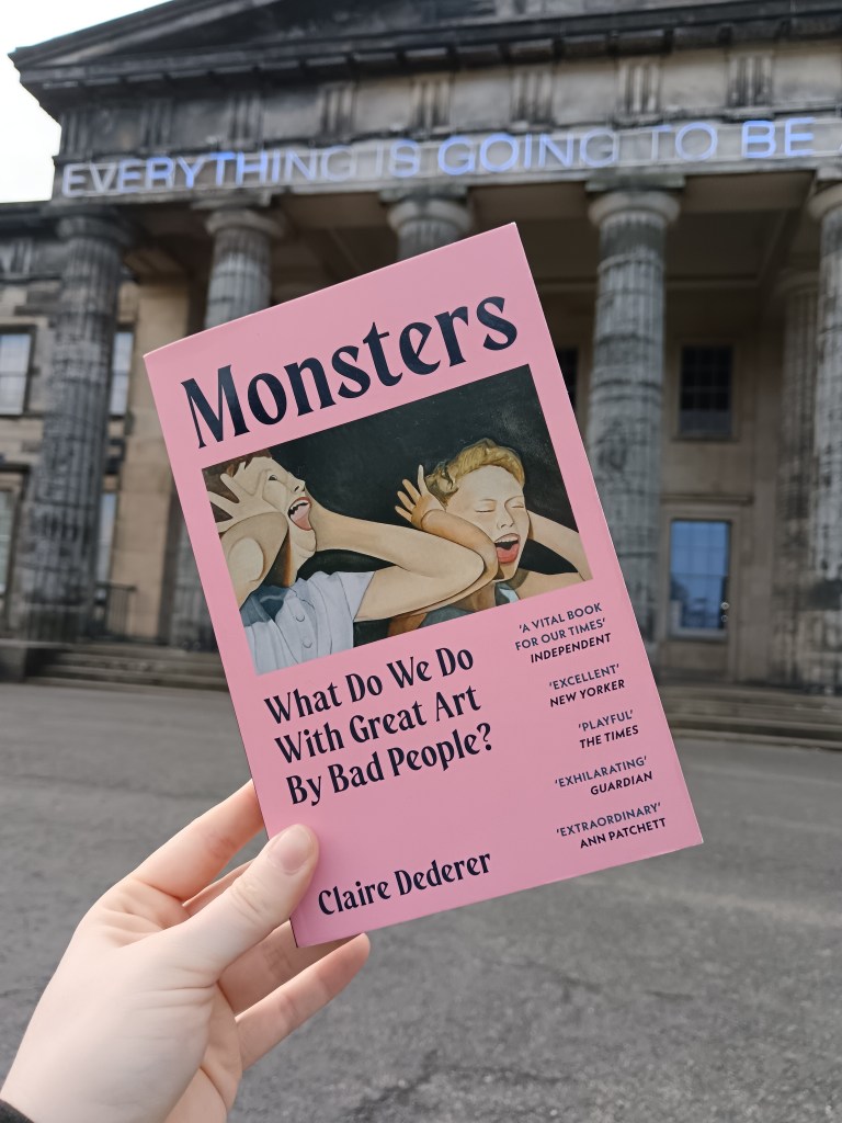 I hold Monsters in front of a gallery