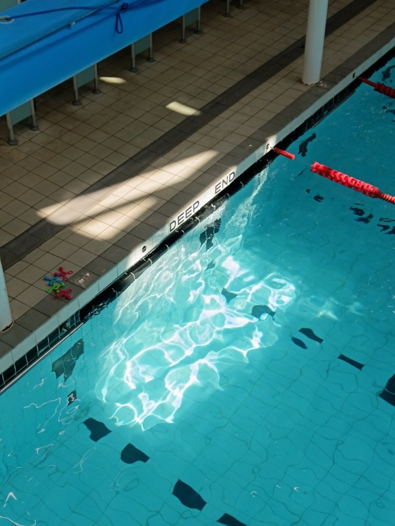 Sunlight glinting off the deep end