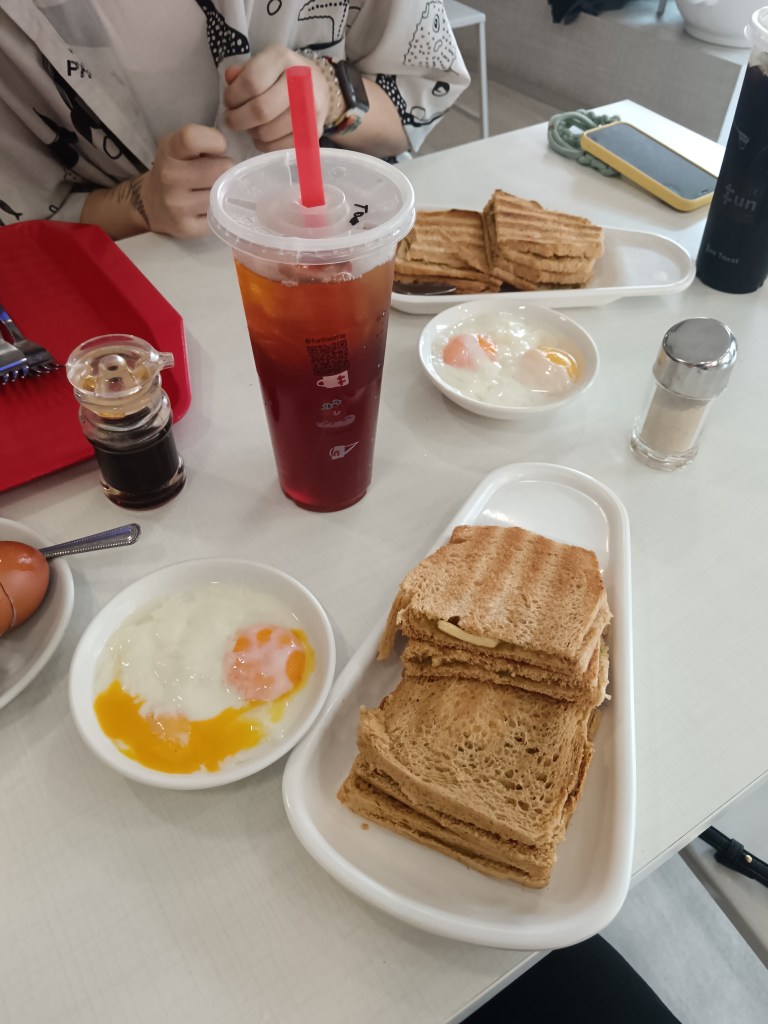 Kaya toast, soft boiled eggs and iced tea