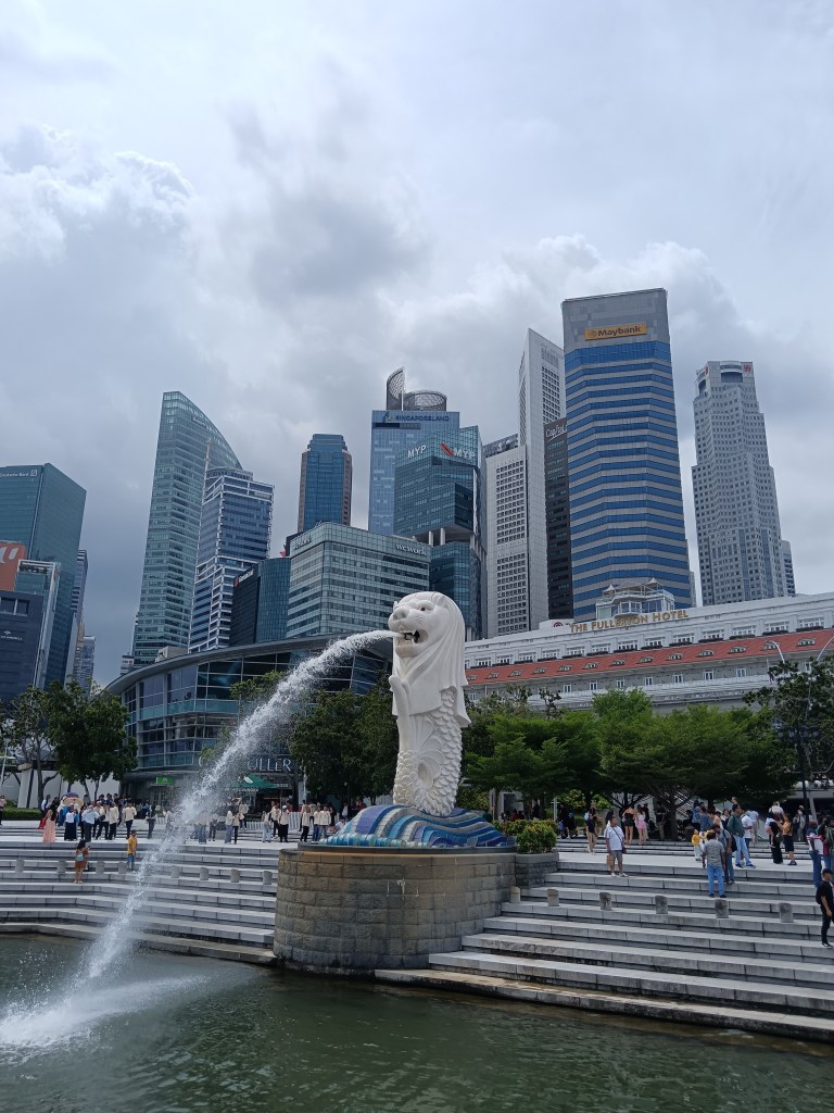 A merlion statue shoots water