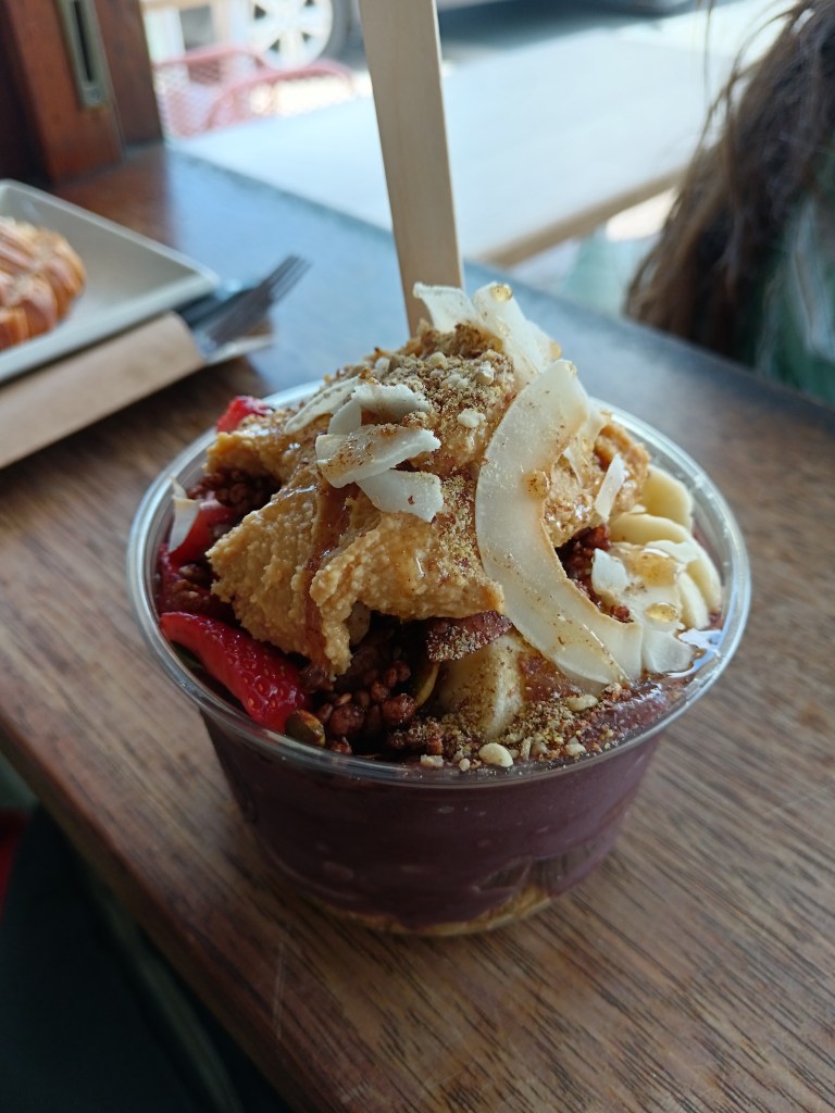 A heaped cup of acai and fruit