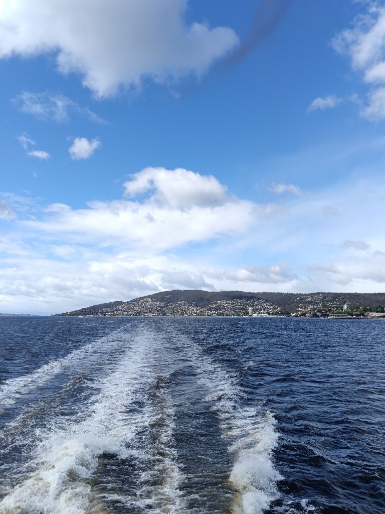 The ferry draws a line in the sea