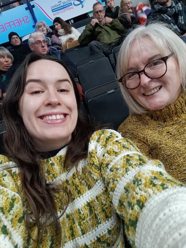 My mum and I smile for a selfie in big jumpers