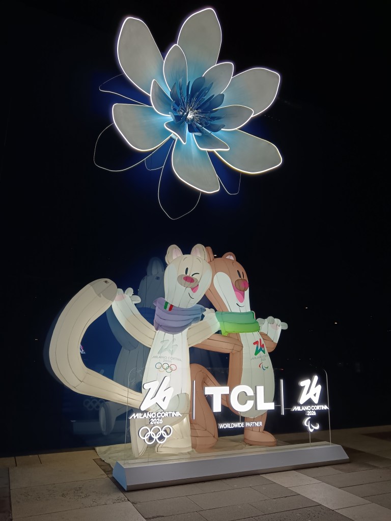 The two winter Olympic stoat mascots glowing