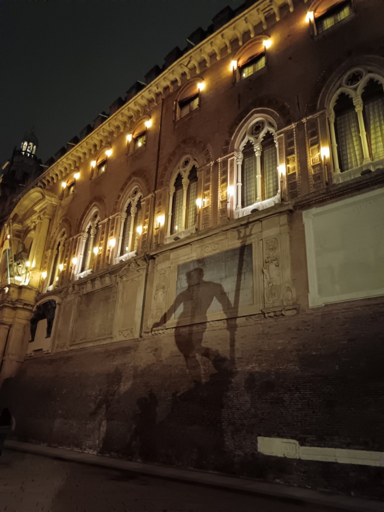 The shadow of a statue of Neptune