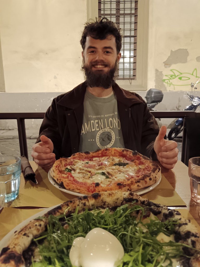 Kit gives thumbs up to our pizzas