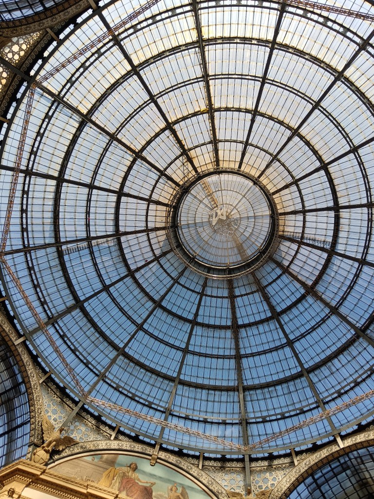A glass domed ceiling from below