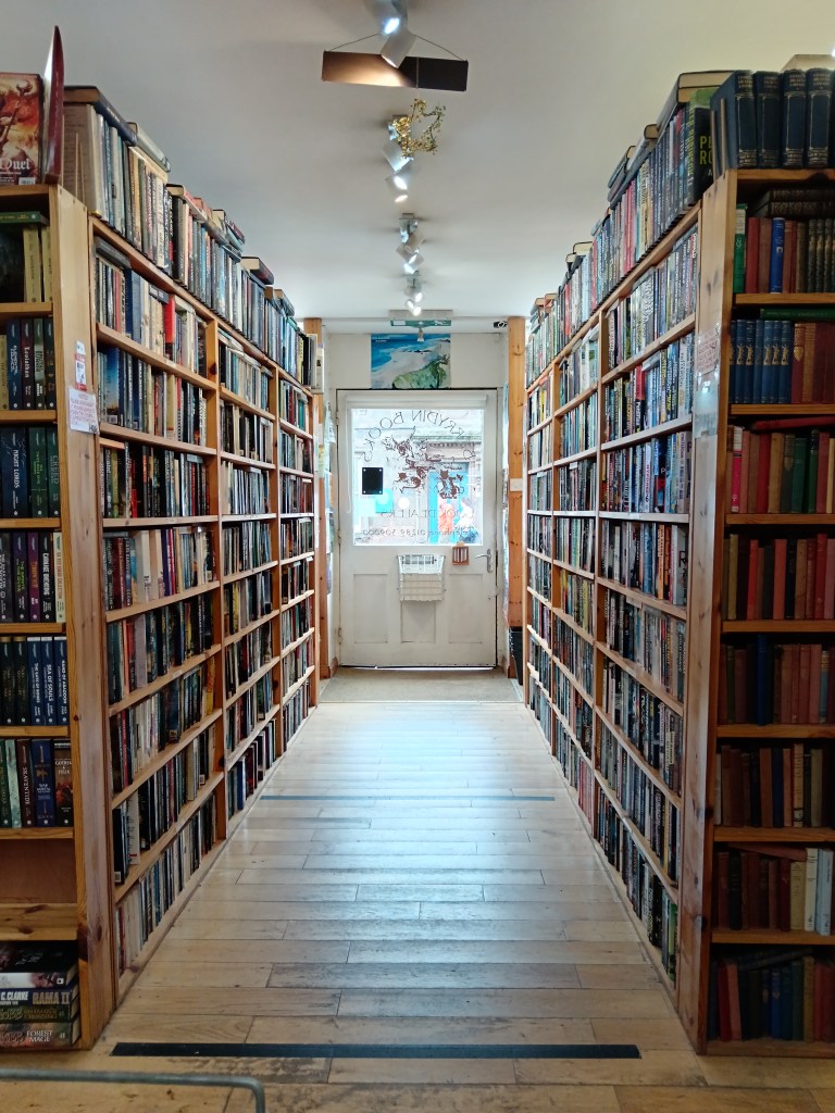 A nice bookshop with shelves stacked with books