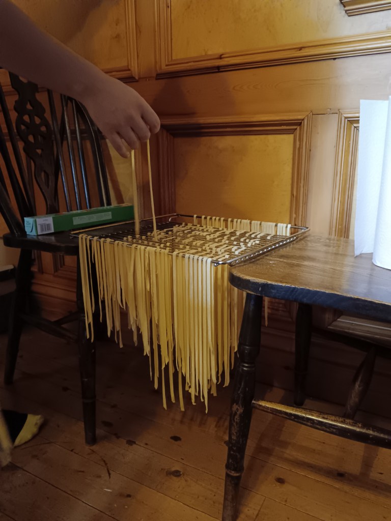 A makeshift rack for drying tagliatelle