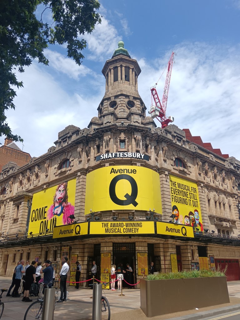Shaftesbury Theatre wrapped in Avenue Q branding