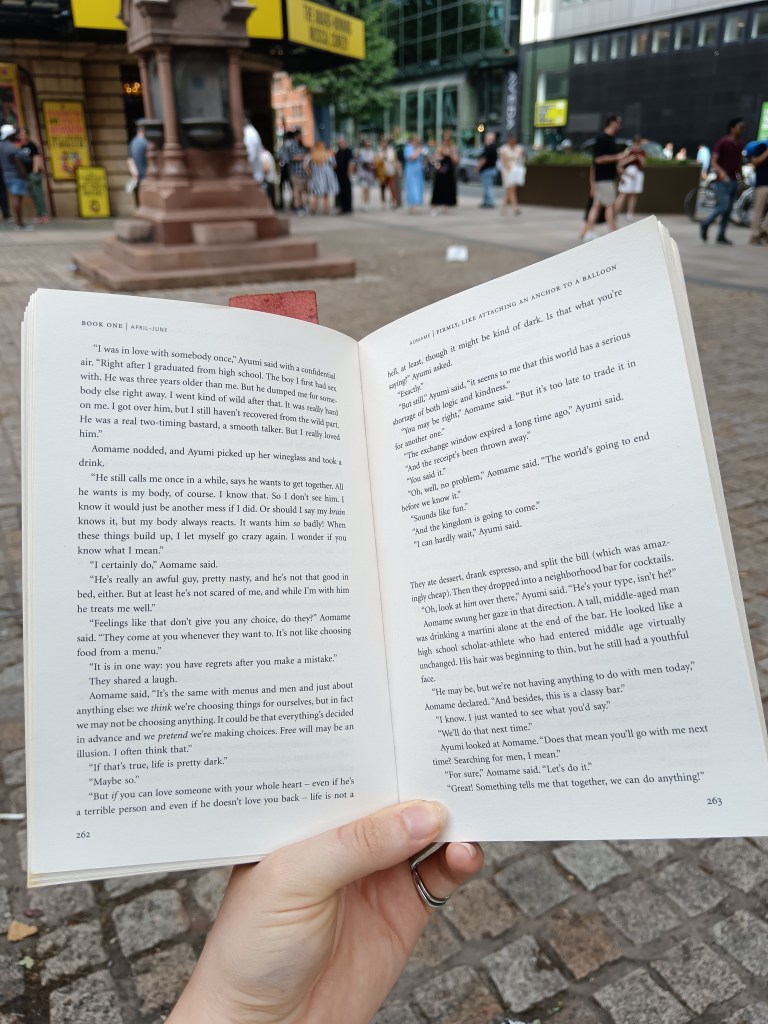 I hold my book open as I read