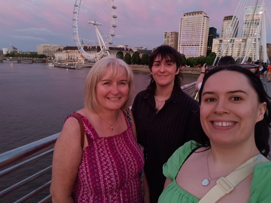 Mum, Claire and I smile for a selfie together