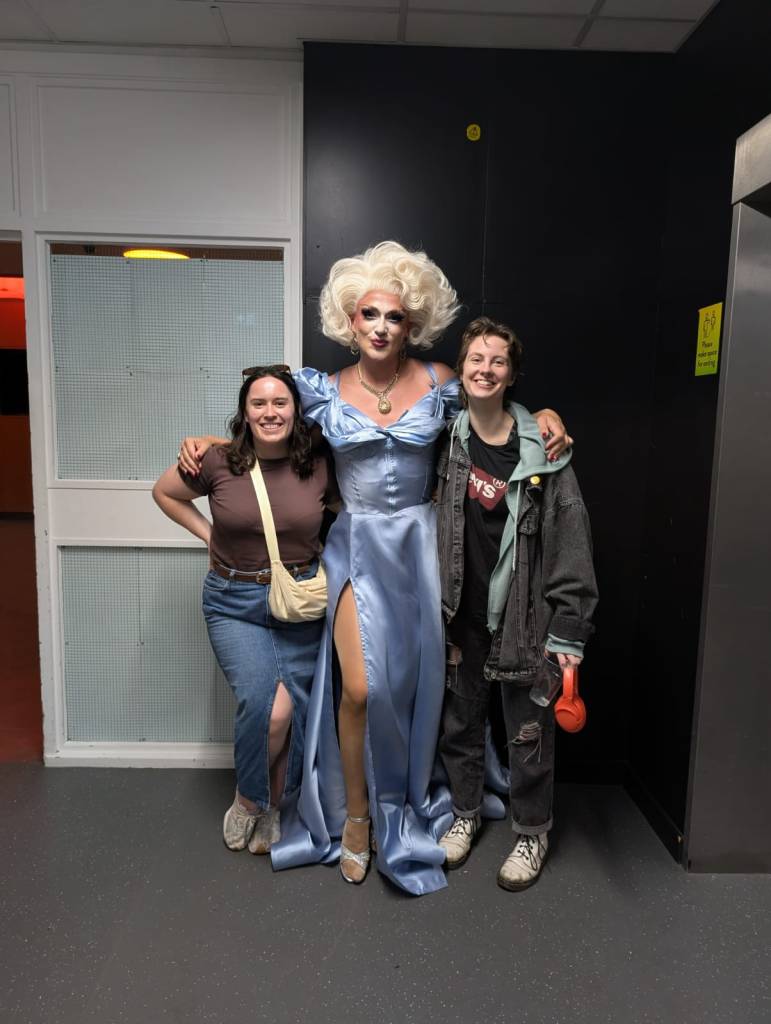 Myself and Ejay smile with the drag queen Skank Sinatra